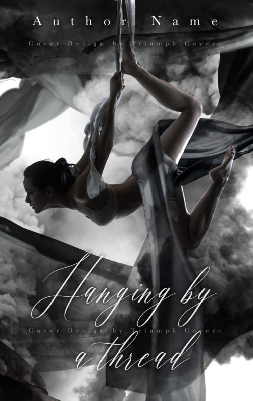 girl hanging by a cloth from the sky